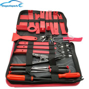 Nylon pry tool removing a door panel without marking the paint